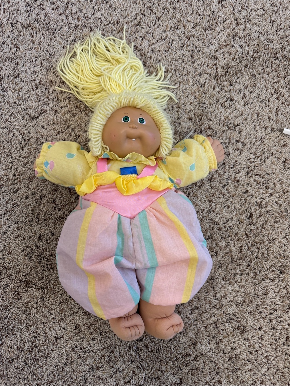 Pastel Yellow-Haired Soft Baby Doll in Striped Pastel Outfit